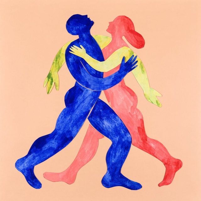 Papier découpé : un homme bleu et une femme corail s'enlacent